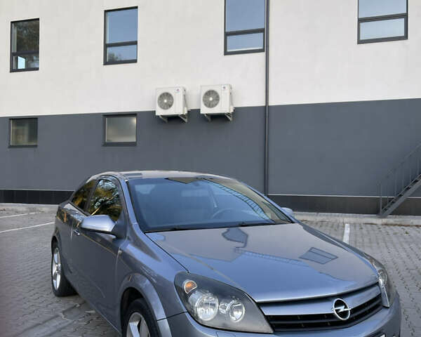 Серый Опель Астра ГТЦ, объемом двигателя 1.6 л и пробегом 203 тыс. км за 3600 $, фото 1 на Automoto.ua