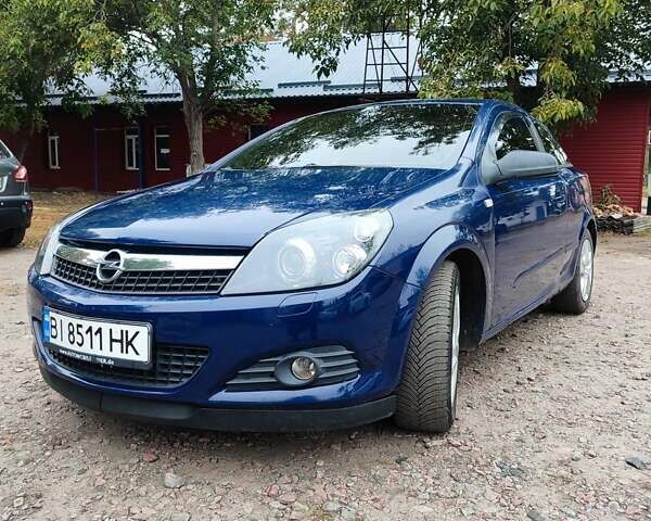 Синий Опель Астра ГТЦ, объемом двигателя 1.6 л и пробегом 233 тыс. км за 6000 $, фото 1 на Automoto.ua