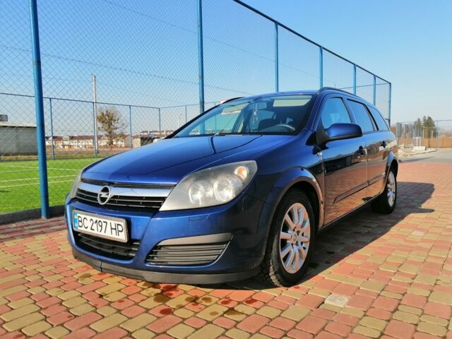 Синій Опель Астра Н, об'ємом двигуна 1.9 л та пробігом 257 тис. км за 5800 $, фото 1 на Automoto.ua