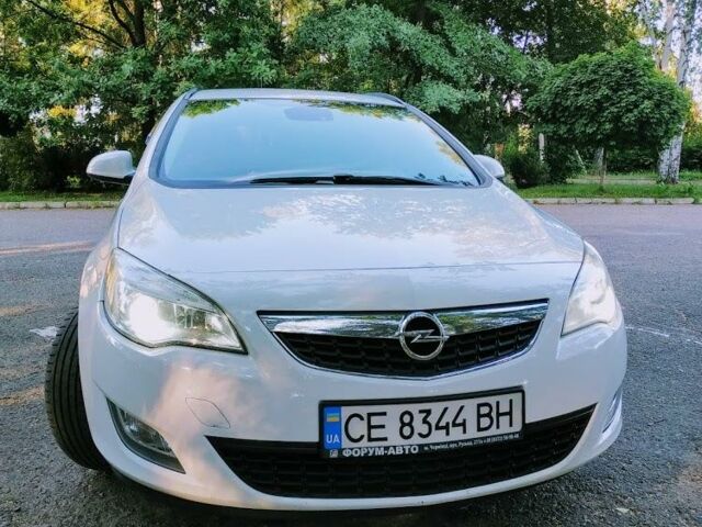 Білий Опель Астра Джей, об'ємом двигуна 1.3 л та пробігом 260 тис. км за 6650 $, фото 1 на Automoto.ua