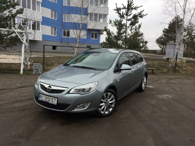 Сірий Опель Астра Джей, об'ємом двигуна 1.7 л та пробігом 250 тис. км за 9300 $, фото 1 на Automoto.ua