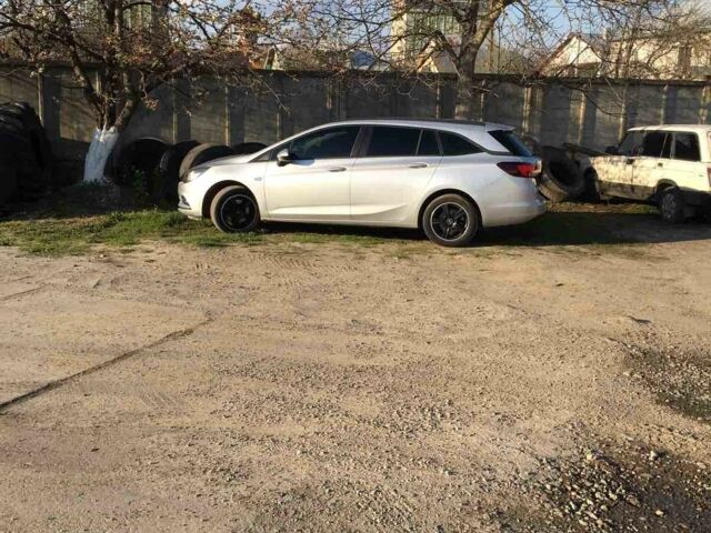 Серый Опель Астра К, объемом двигателя 1.6 л и пробегом 180 тыс. км за 9650 $, фото 1 на Automoto.ua