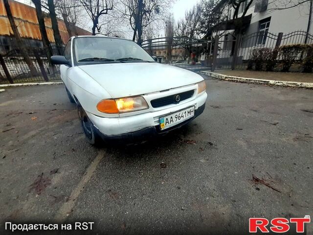 Белый Опель Астра, объемом двигателя 1.3 л и пробегом 252 тыс. км за 850 $, фото 1 на Automoto.ua