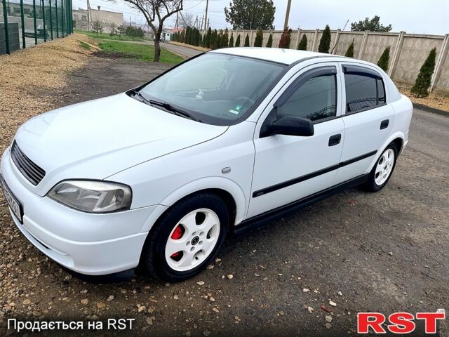 Белый Опель Астра, объемом двигателя 2 л и пробегом 239 тыс. км за 3499 $, фото 1 на Automoto.ua