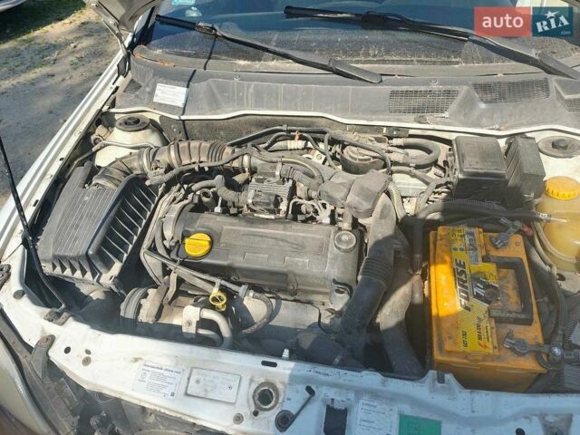 Белый Опель Астра, объемом двигателя 1.69 л и пробегом 370 тыс. км за 1700 $, фото 1 на Automoto.ua