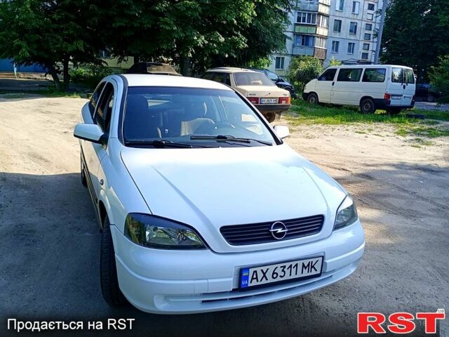 Белый Опель Астра, объемом двигателя 1.4 л и пробегом 284 тыс. км за 3200 $, фото 1 на Automoto.ua