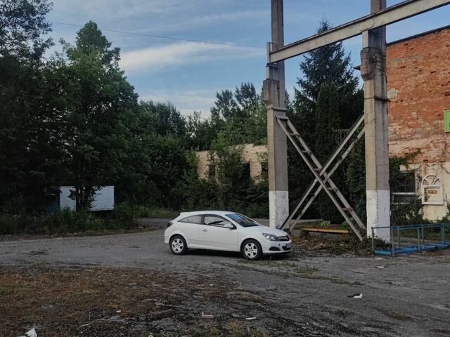 Белый Опель Астра, объемом двигателя 1.2 л и пробегом 470 тыс. км за 4215 $, фото 1 на Automoto.ua