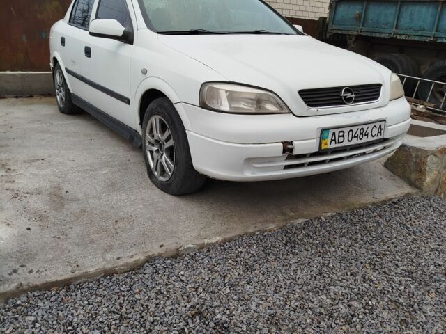 Белый Опель Астра, объемом двигателя 1.8 л и пробегом 217 тыс. км за 1700 $, фото 1 на Automoto.ua