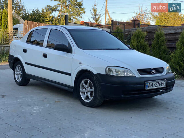 Білий Опель Астра, об'ємом двигуна 1.39 л та пробігом 250 тис. км за 2850 $, фото 1 на Automoto.ua