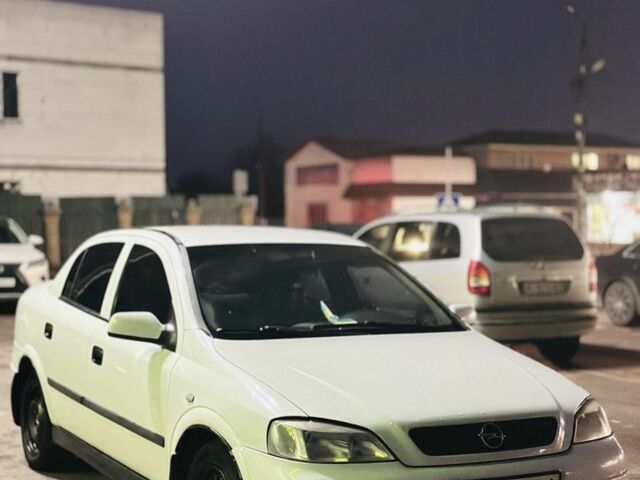 Белый Опель Астра, объемом двигателя 1.4 л и пробегом 340 тыс. км за 3800 $, фото 1 на Automoto.ua