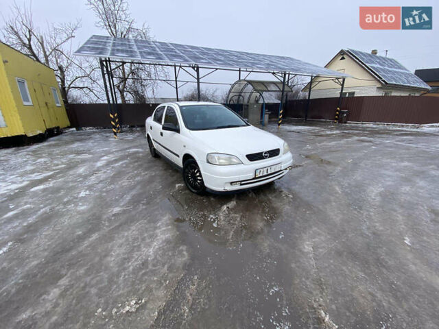 Белый Опель Астра, объемом двигателя 1.4 л и пробегом 240 тыс. км за 2399 $, фото 1 на Automoto.ua