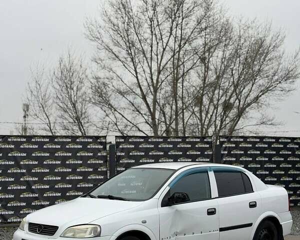 Белый Опель Астра, объемом двигателя 1.4 л и пробегом 221 тыс. км за 1700 $, фото 1 на Automoto.ua