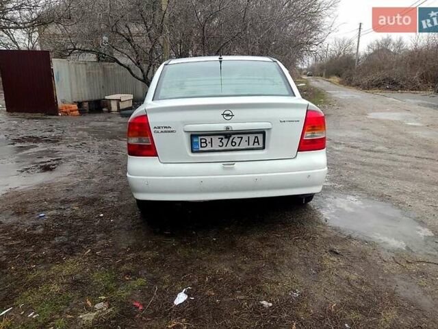 Белый Опель Астра, объемом двигателя 1.4 л и пробегом 296 тыс. км за 3200 $, фото 1 на Automoto.ua