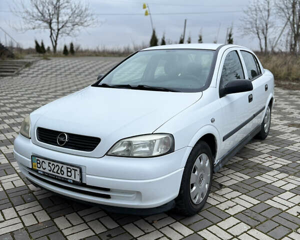 Белый Опель Астра, объемом двигателя 1.6 л и пробегом 280 тыс. км за 2999 $, фото 1 на Automoto.ua