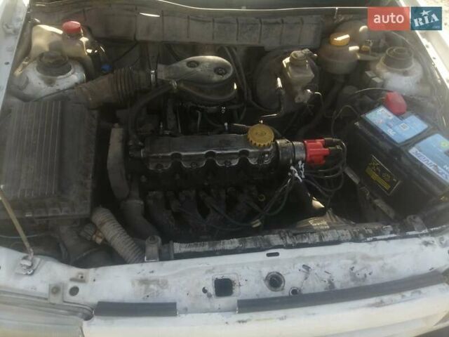 Белый Опель Астра, объемом двигателя 1.39 л и пробегом 300 тыс. км за 1200 $, фото 1 на Automoto.ua