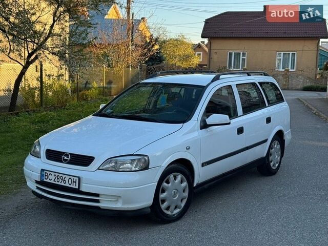 Белый Опель Астра, объемом двигателя 1.7 л и пробегом 376 тыс. км за 2300 $, фото 1 на Automoto.ua