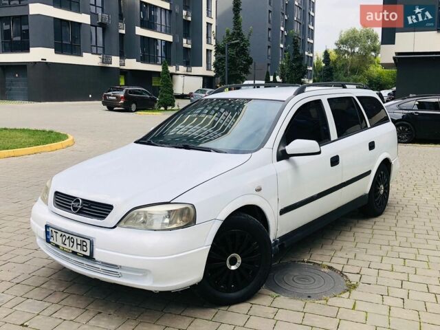 Белый Опель Астра, объемом двигателя 1.9 л и пробегом 300 тыс. км за 1750 $, фото 1 на Automoto.ua