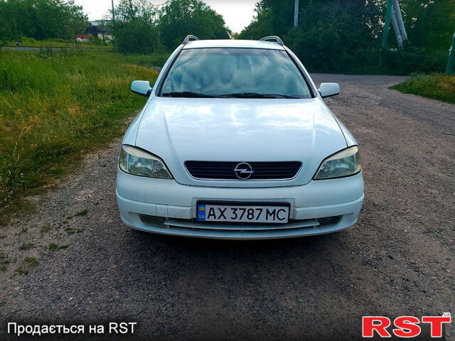 Белый Опель Астра, объемом двигателя 1.8 л и пробегом 250 тыс. км за 2500 $, фото 1 на Automoto.ua
