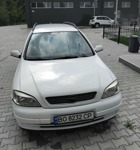 Белый Опель Астра, объемом двигателя 1.69 л и пробегом 380 тыс. км за 3000 $, фото 1 на Automoto.ua