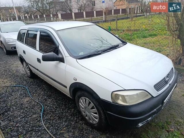 Белый Опель Астра, объемом двигателя 1.4 л и пробегом 327 тыс. км за 2300 $, фото 1 на Automoto.ua