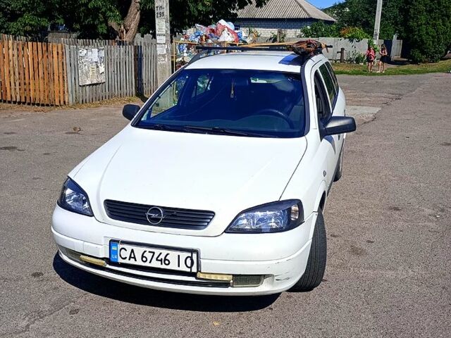 Белый Опель Астра, объемом двигателя 1.7 л и пробегом 400 тыс. км за 2300 $, фото 1 на Automoto.ua