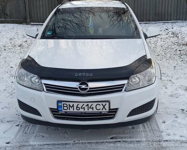 Белый Опель Астра, объемом двигателя 1.25 л и пробегом 220 тыс. км за 5300 $, фото 1 на Automoto.ua