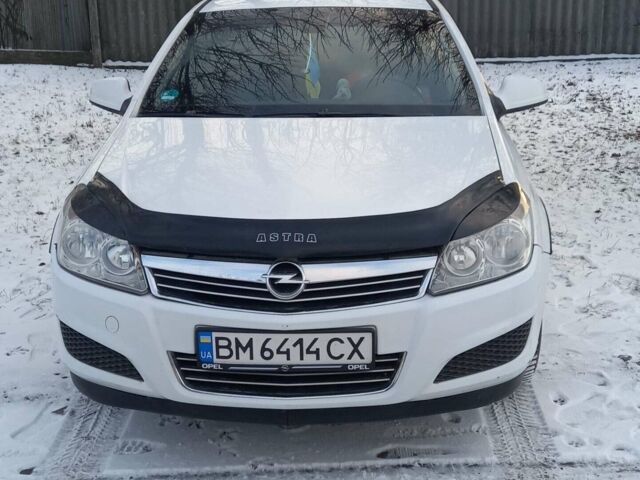 Белый Опель Астра, объемом двигателя 1.25 л и пробегом 220 тыс. км за 5300 $, фото 1 на Automoto.ua