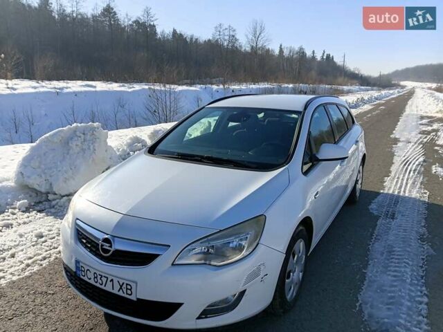 Білий Опель Астра, об'ємом двигуна 1.25 л та пробігом 370 тис. км за 5300 $, фото 1 на Automoto.ua