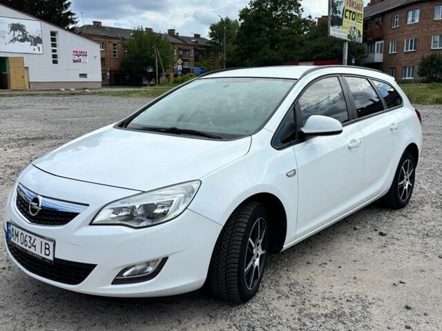 Белый Опель Астра, объемом двигателя 1.69 л и пробегом 202 тыс. км за 7900 $, фото 1 на Automoto.ua