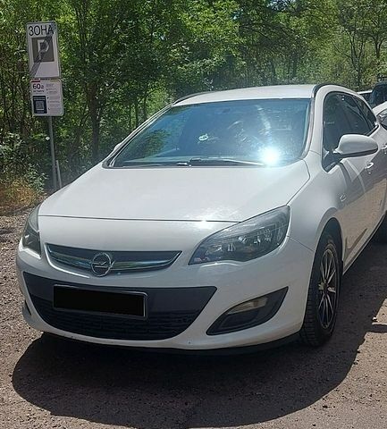 Белый Опель Астра, объемом двигателя 1.69 л и пробегом 213 тыс. км за 6700 $, фото 1 на Automoto.ua