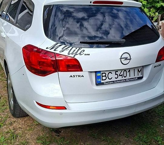 Білий Опель Астра, об'ємом двигуна 1.69 л та пробігом 317 тис. км за 6200 $, фото 1 на Automoto.ua