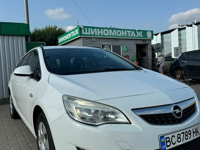 Білий Опель Астра, об'ємом двигуна 1.69 л та пробігом 203 тис. км за 7500 $, фото 1 на Automoto.ua