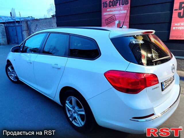 Белый Опель Астра, объемом двигателя 1.2 л и пробегом 24000 тыс. км за 6000 $, фото 1 на Automoto.ua
