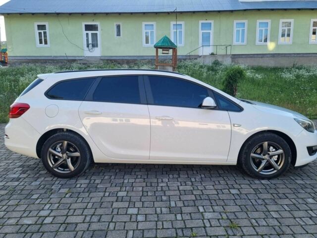 Белый Опель Астра, объемом двигателя 1.25 л и пробегом 195 тыс. км за 6600 $, фото 1 на Automoto.ua