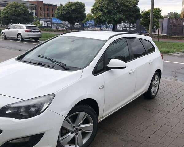 Белый Опель Астра, объемом двигателя 2 л и пробегом 207 тыс. км за 8999 $, фото 1 на Automoto.ua