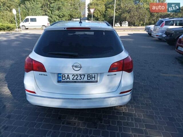 Білий Опель Астра, об'ємом двигуна 1.36 л та пробігом 77 тис. км за 8700 $, фото 1 на Automoto.ua