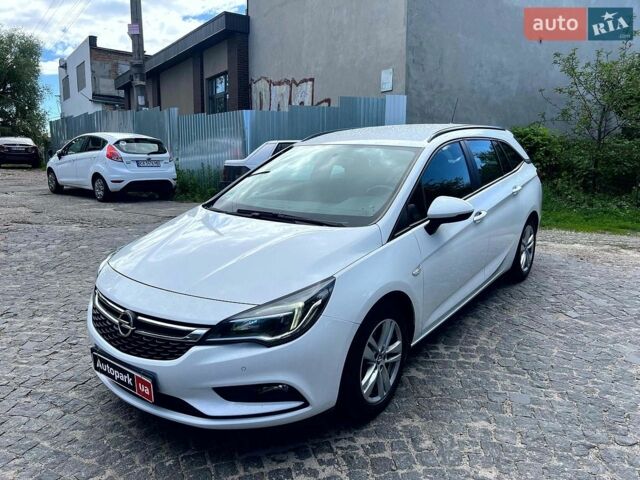 Білий Опель Астра, об'ємом двигуна 1.6 л та пробігом 203 тис. км за 12990 $, фото 1 на Automoto.ua