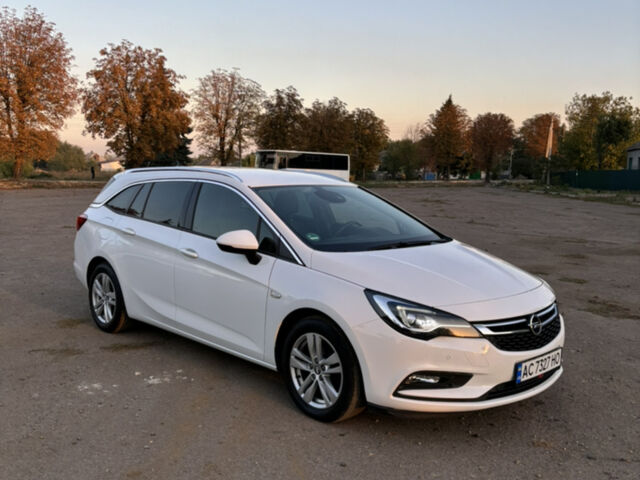 Белый Опель Астра, объемом двигателя 1.6 л и пробегом 210 тыс. км за 12000 $, фото 1 на Automoto.ua