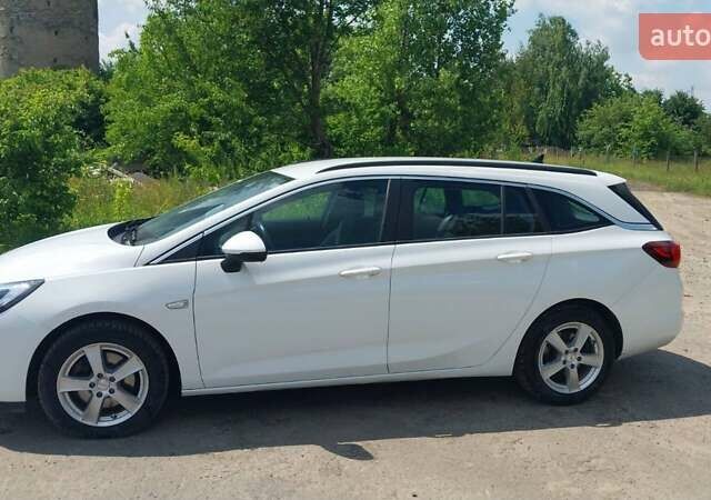 Белый Опель Астра, объемом двигателя 1.6 л и пробегом 124 тыс. км за 12800 $, фото 1 на Automoto.ua