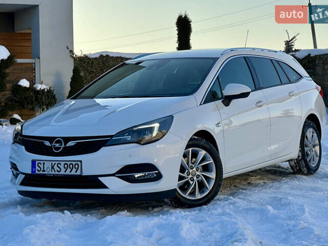 Белый Опель Астра, объемом двигателя 1.5 л и пробегом 124 тыс. км за 13799 $, фото 1 на Automoto.ua