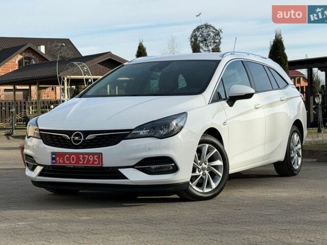 Білий Опель Астра, об'ємом двигуна 1.5 л та пробігом 124 тис. км за 13900 $, фото 1 на Automoto.ua