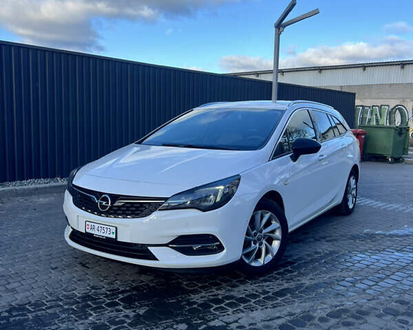 Білий Опель Астра, об'ємом двигуна 1.5 л та пробігом 210 тис. км за 13700 $, фото 1 на Automoto.ua