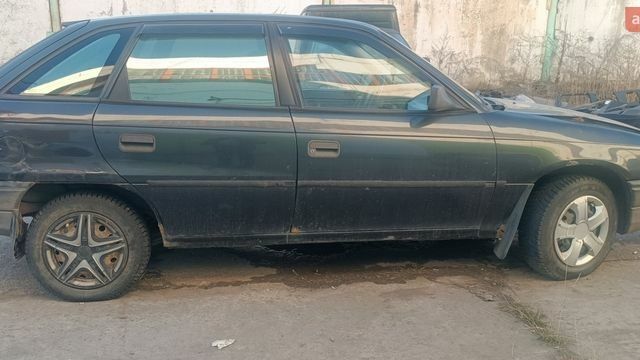 Черный Опель Астра, объемом двигателя 1.39 л и пробегом 1 тыс. км за 550 $, фото 1 на Automoto.ua