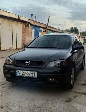 Чорний Опель Астра, об'ємом двигуна 1.6 л та пробігом 385 тис. км за 3900 $, фото 1 на Automoto.ua