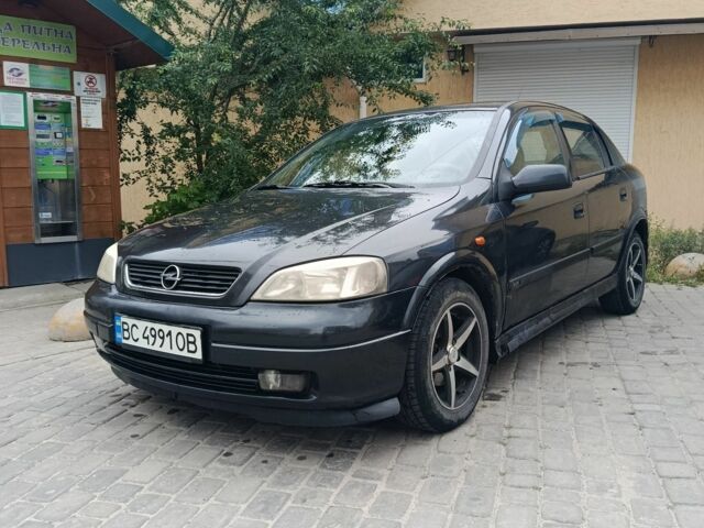 Чорний Опель Астра, об'ємом двигуна 1.4 л та пробігом 300 тис. км за 1430 $, фото 1 на Automoto.ua