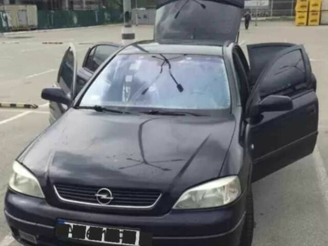 Черный Опель Астра, объемом двигателя 1.6 л и пробегом 173 тыс. км за 3300 $, фото 1 на Automoto.ua