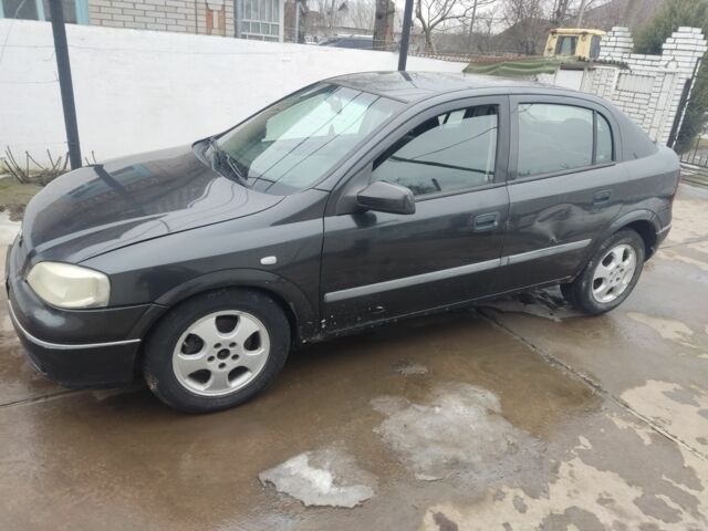 Черный Опель Астра, объемом двигателя 2 л и пробегом 300 тыс. км за 1000 $, фото 1 на Automoto.ua