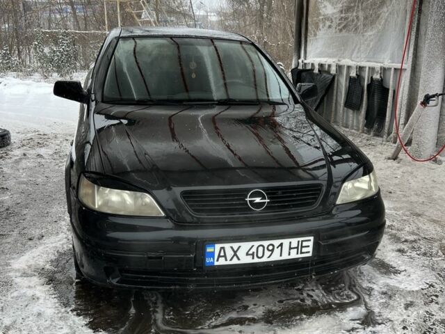 Черный Опель Астра, объемом двигателя 1.6 л и пробегом 250 тыс. км за 1900 $, фото 1 на Automoto.ua