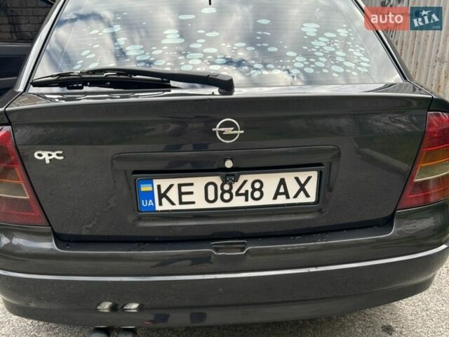 Черный Опель Астра, объемом двигателя 2 л и пробегом 319 тыс. км за 3500 $, фото 1 на Automoto.ua