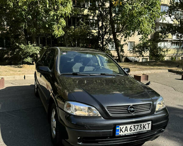 Черный Опель Астра, объемом двигателя 1.6 л и пробегом 52 тыс. км за 4700 $, фото 1 на Automoto.ua